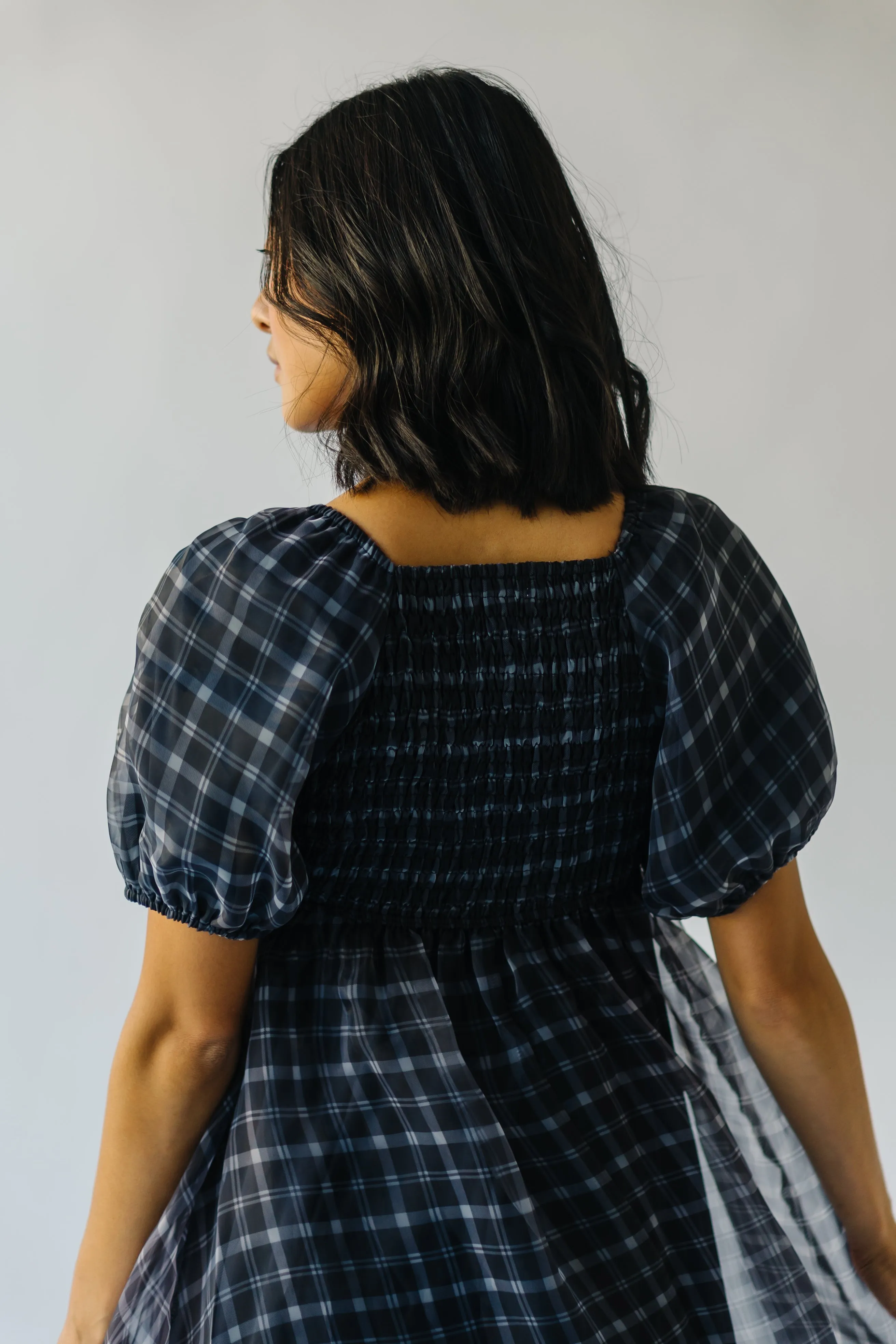 The Osburn Babydoll Dress in Black Plaid